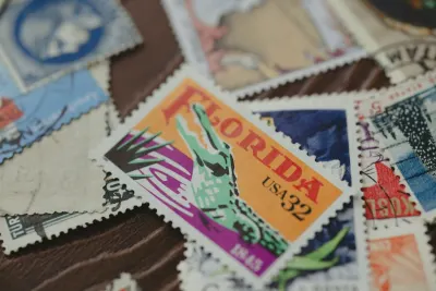 Collection of colorful postage stamps with "Florida" text visible on one stamp